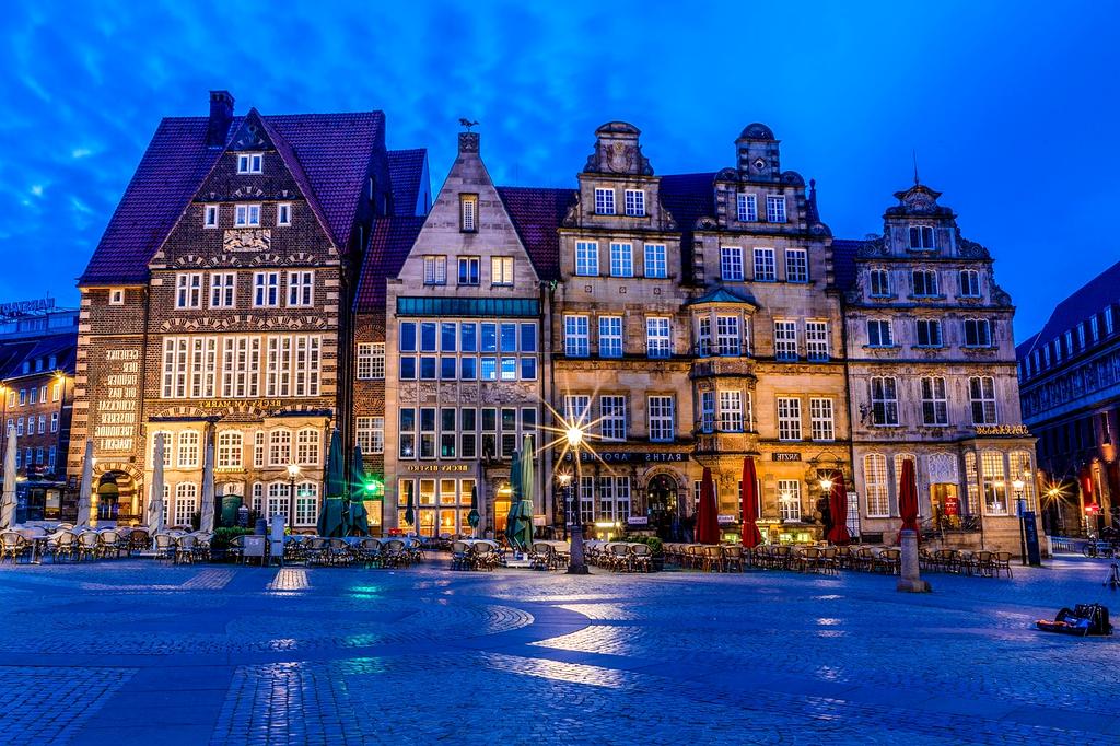 Traveler exploring historic old town with colorful buildings and cobblestone streets